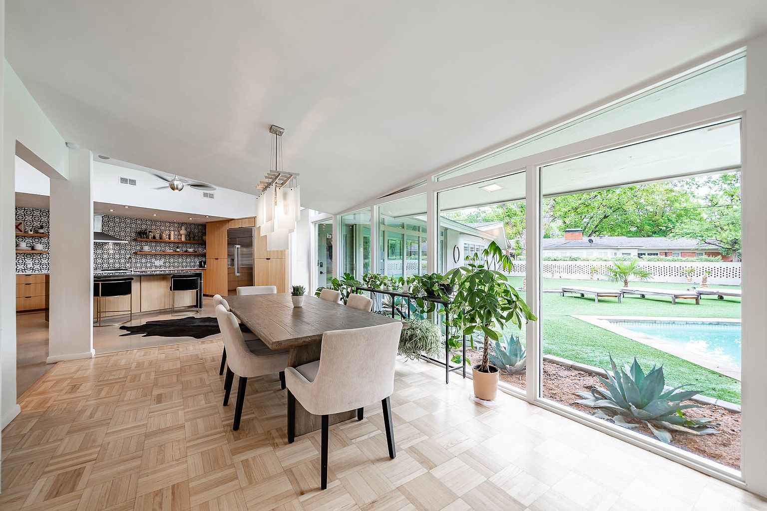 Listing photo: dining area with glass wall