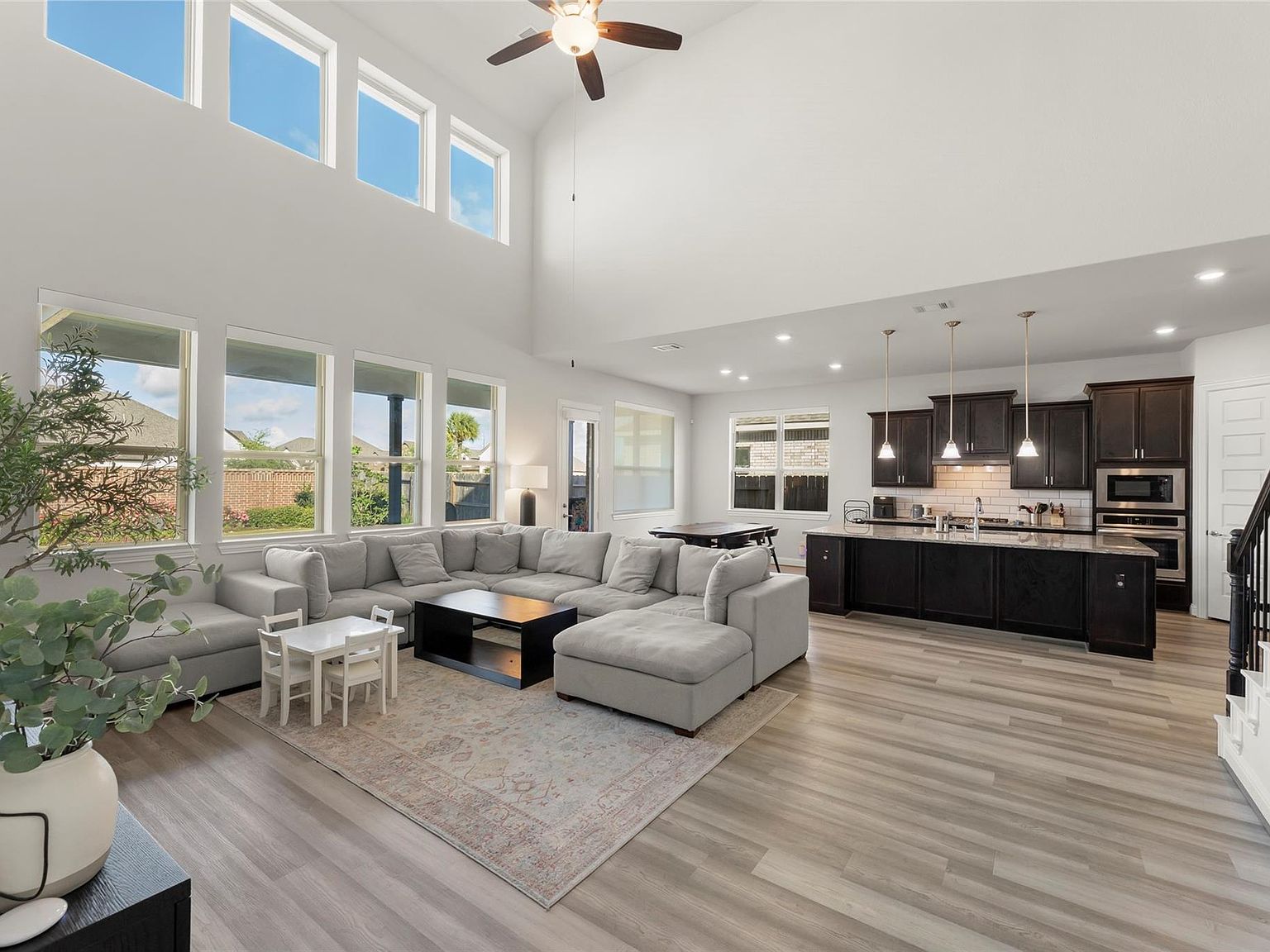 Listing photo: kitchen and living area